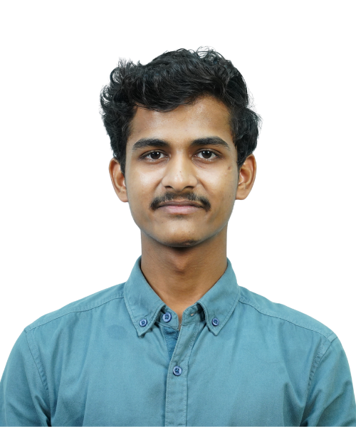 Portrait of a young man with short dark hair and a mustache wearing a teal button-up shirt, facing the camera with a neutral expression.