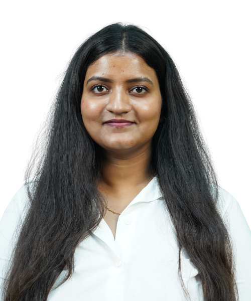 Portrait of a woman with long dark hair wearing a white blouse, looking at the camera.