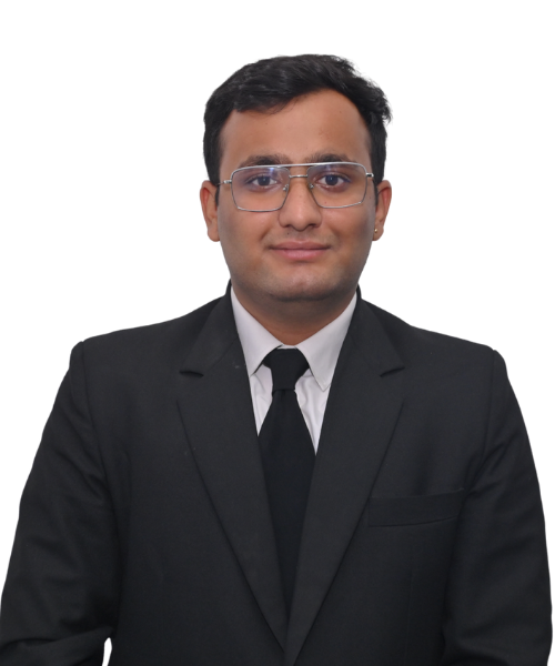 Professional headshot of a man wearing a black suit, white shirt, and black tie, facing the camera with a neutral expression.