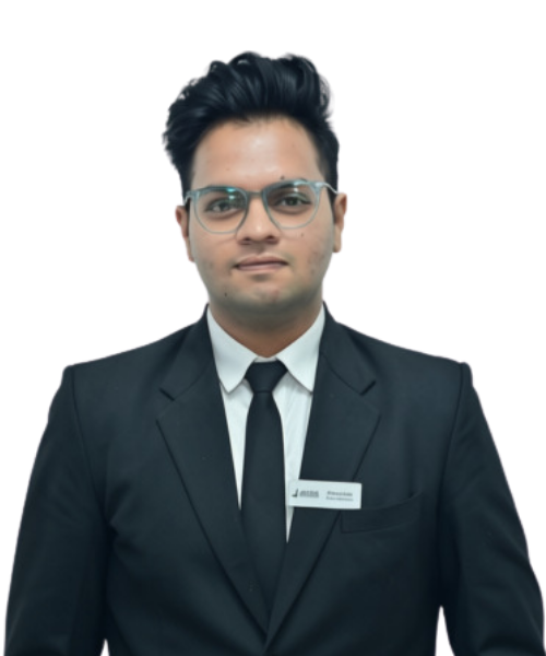 Professional portrait of a man in a black suit, white shirt, black tie, wearing glasses and a name badge facing the camera