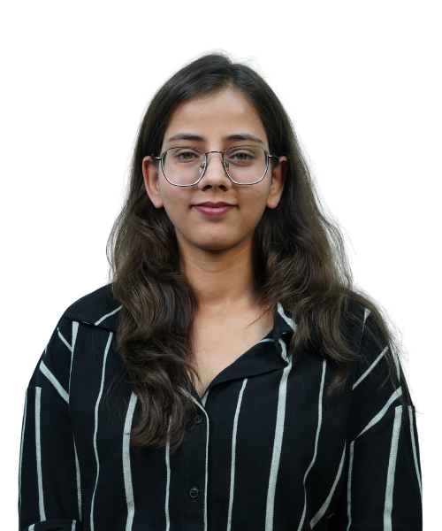 Young woman with long dark hair and round glasses, wearing a black striped shirt, facing the camera against a transparent background.