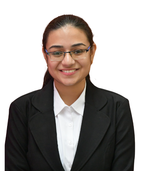 Smiling young woman with dark hair tied back, wearing glasses, a white shirt and black blazer (professional headshot).