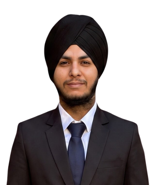 Portrait of a young man wearing a black turban and suit, looking at the camera.