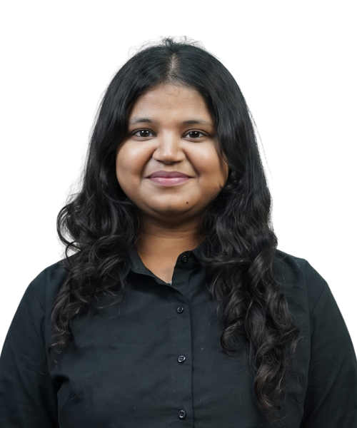 Portrait of a woman with long dark hair, wearing a black button-up shirt, smiling at the camera.