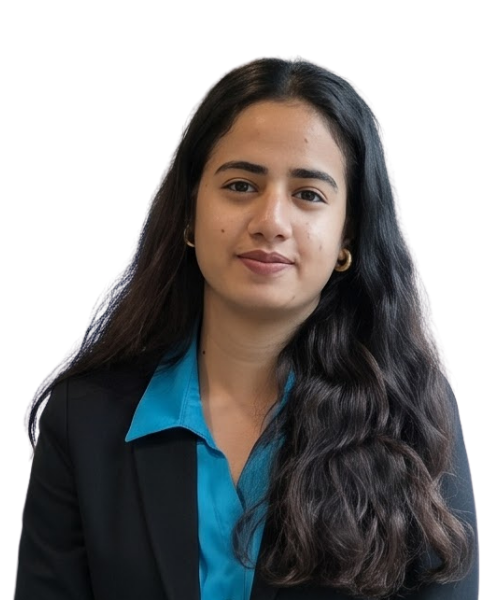 Portrait of a young woman with long dark hair wearing a teal blouse and black blazer, smiling softly.