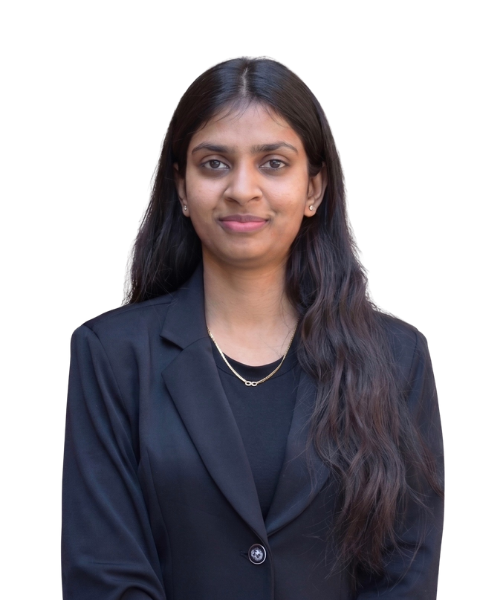 Professional portrait of a woman with long dark hair wearing a black blazer and a simple necklace, facing the camera with a neutral expression.