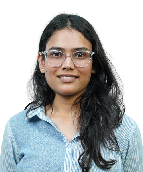 Portrait of a woman with long dark hair and clear glasses, wearing a light blue striped shirt.