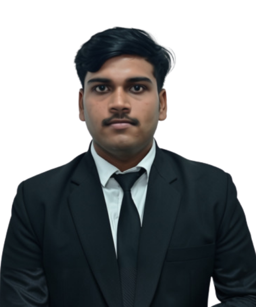 Professional headshot of a man in a black suit and tie facing the camera against a transparent background.