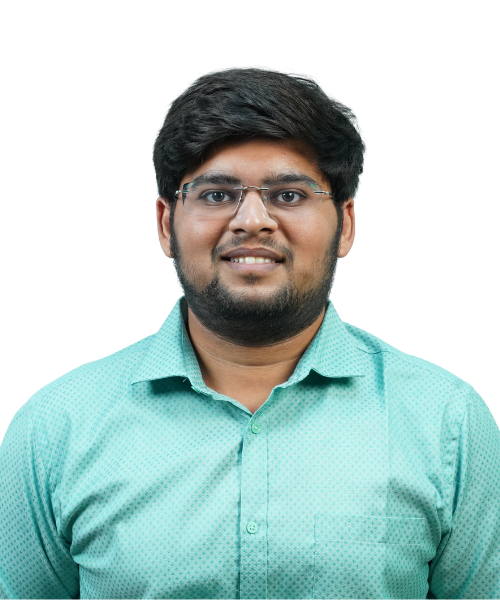 Portrait of a smiling man with glasses wearing a teal shirt.